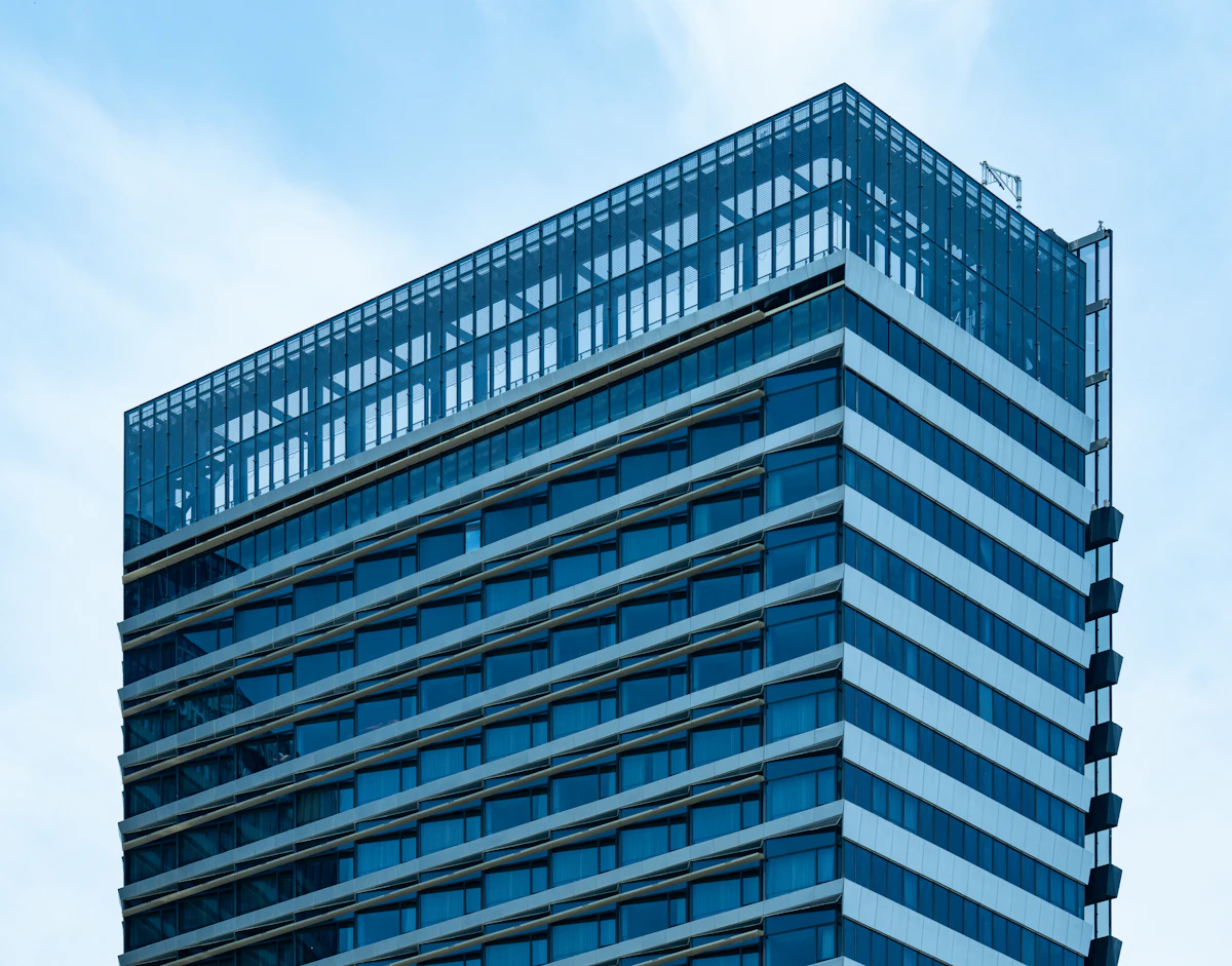 Modern skyscraper reaching toward the sky, symbolising clarity and perspective