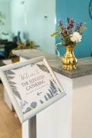 A sign welcomes guests to the elevated gathering.