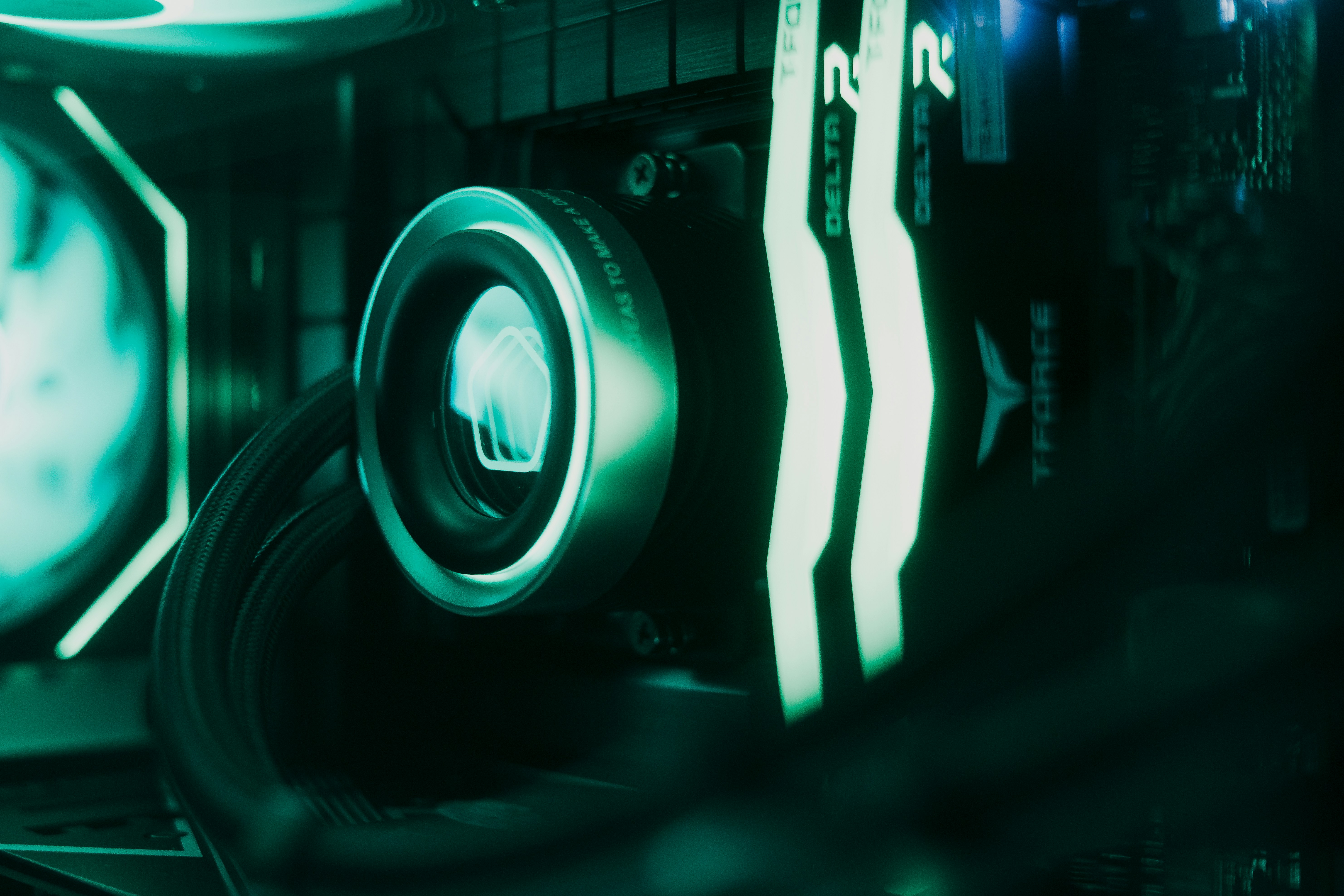 Computer hardware illuminated with a green hue.