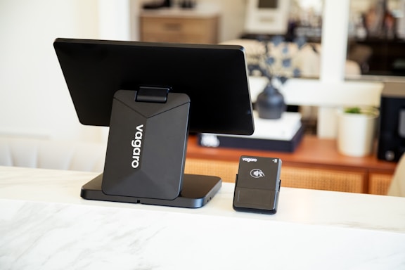 A point of sale system is displayed on a counter.