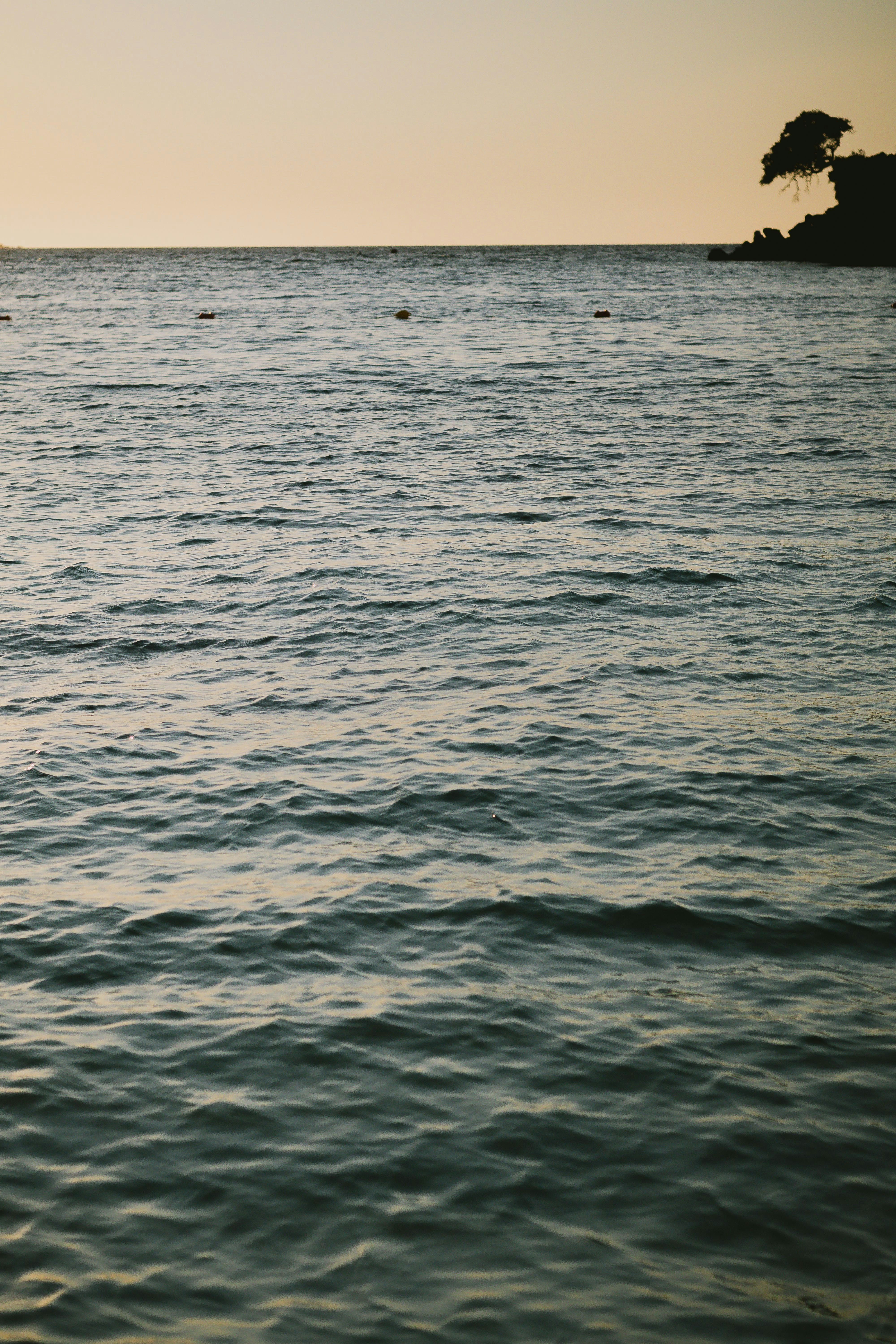 A scenic view of Ksamil's coastline with clear blue water