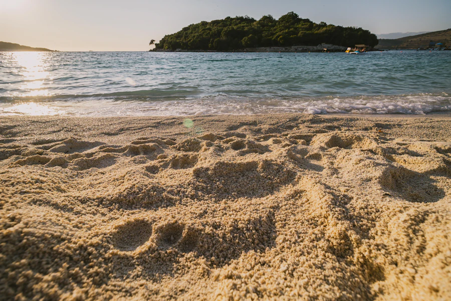 Sandy Ksamil beach with small islands offshore
