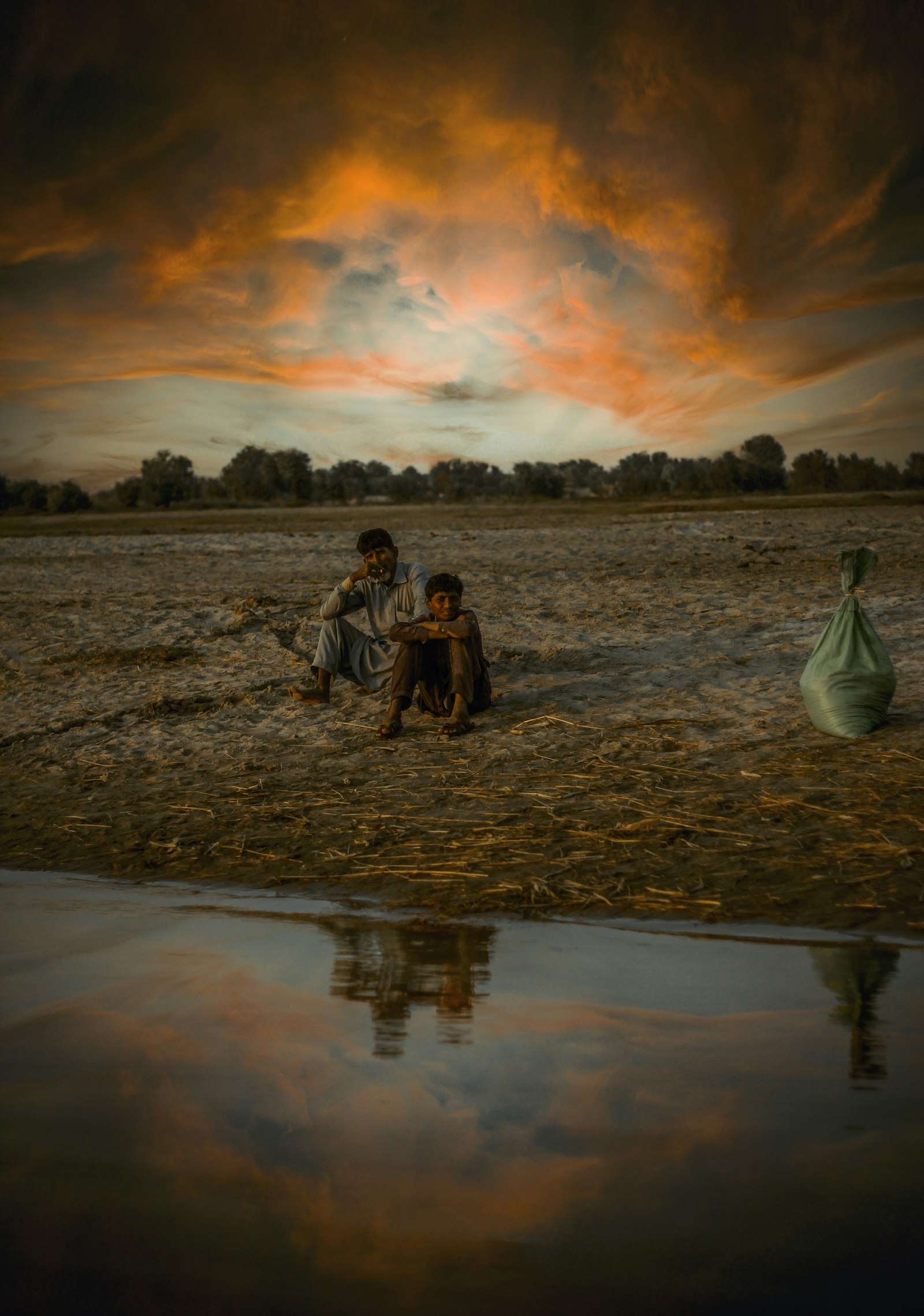 Children in a rural community in Pakistan at sunset