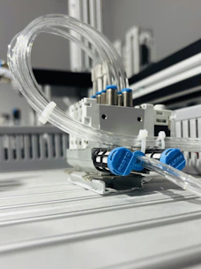 Pneumatic system with connected transparent tubing.