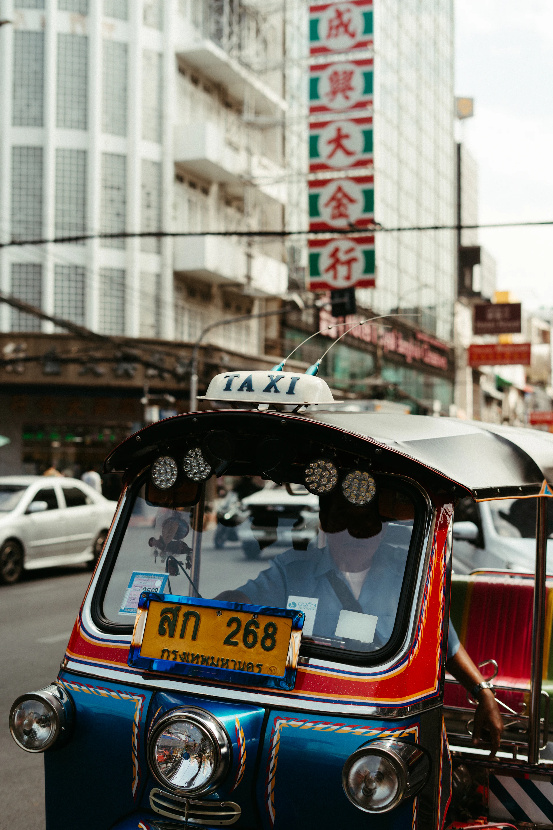 Tuk-tuk on a busy Sri Lankan street