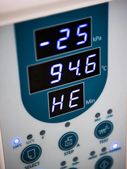 A digital display shows pressure and temperature readings.