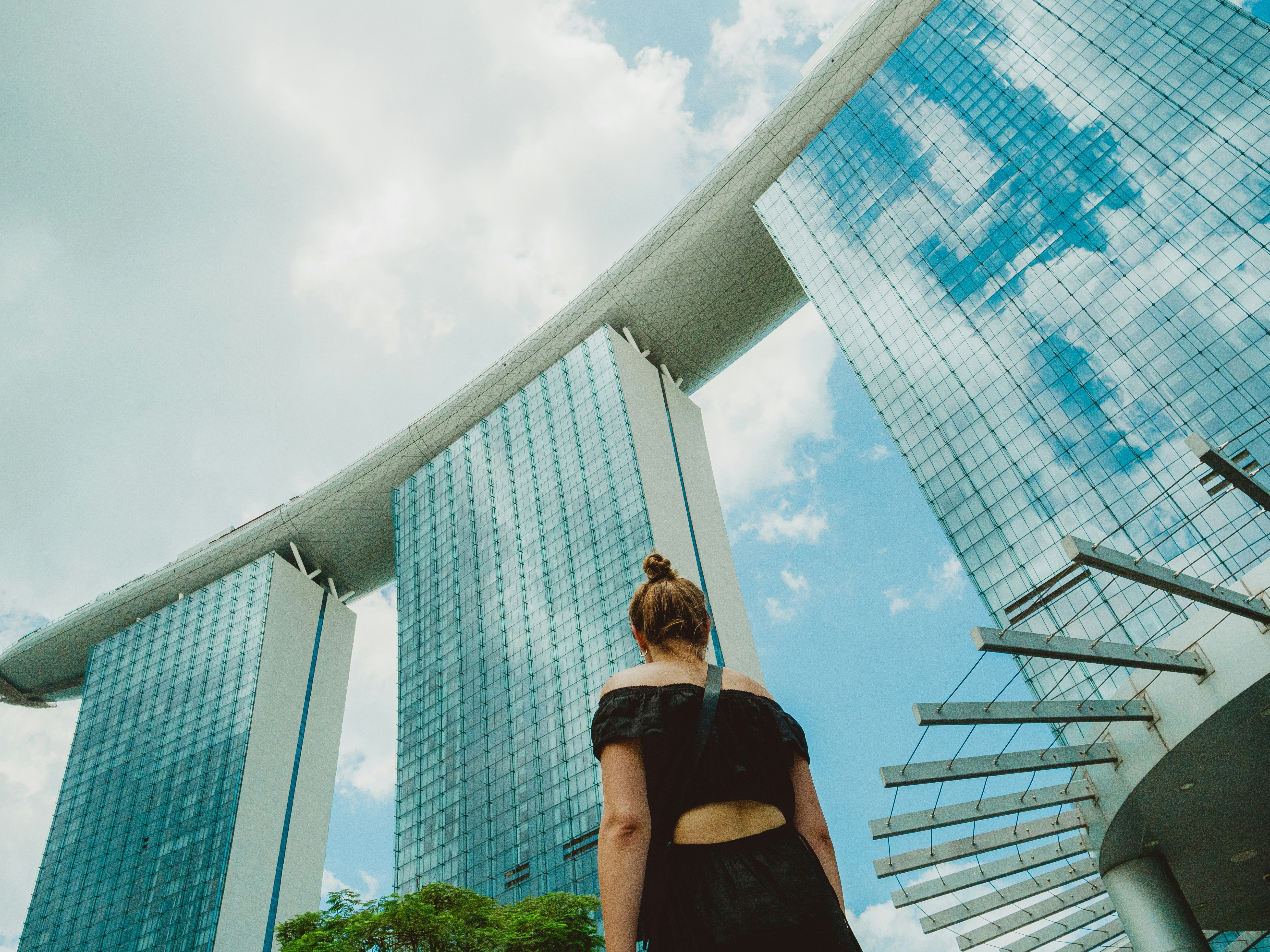 Woman gazes at the impressive marina bay sands.