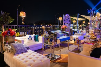Outdoor lounge with beautiful furniture and lights.