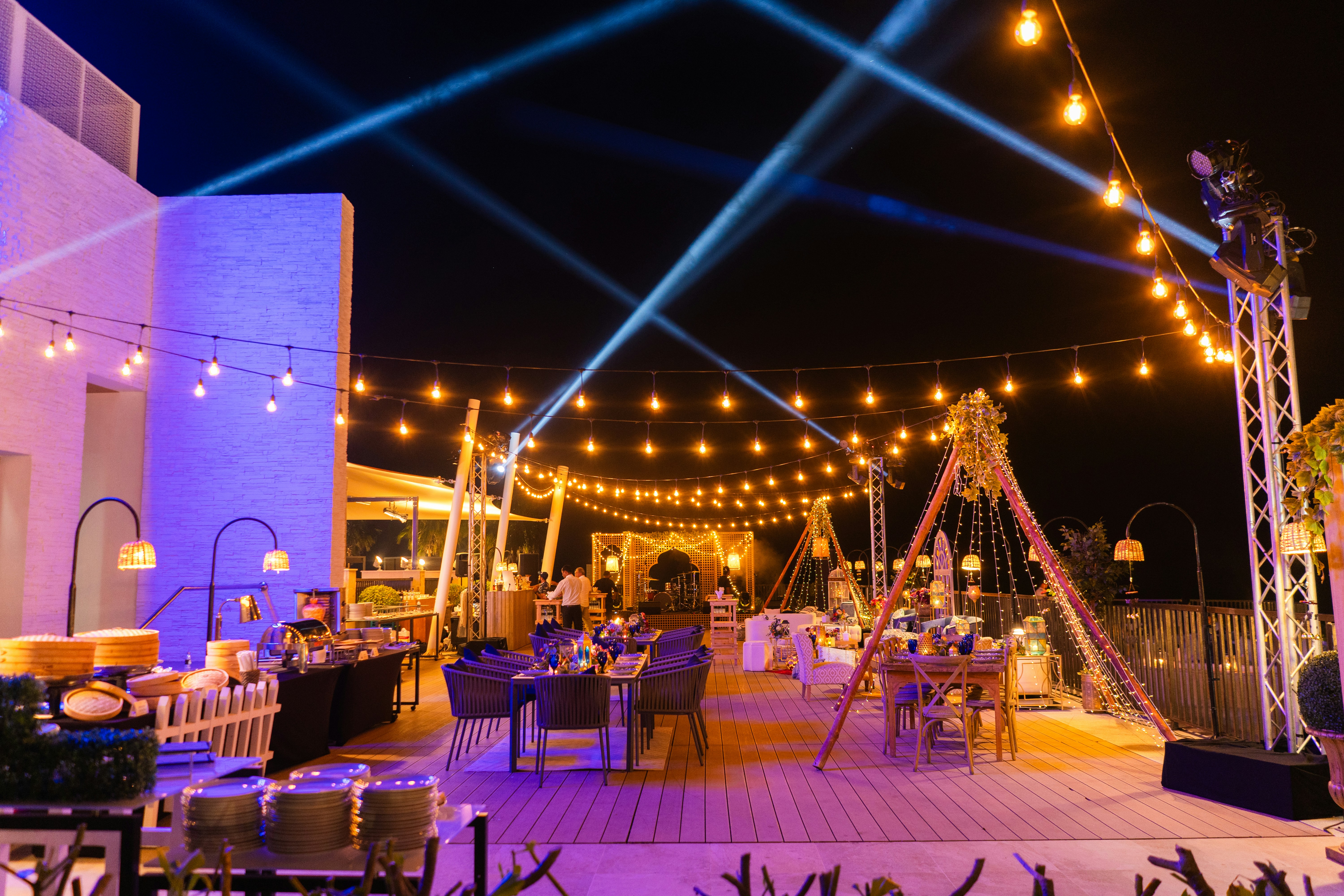 Beautiful night event with lights and tables