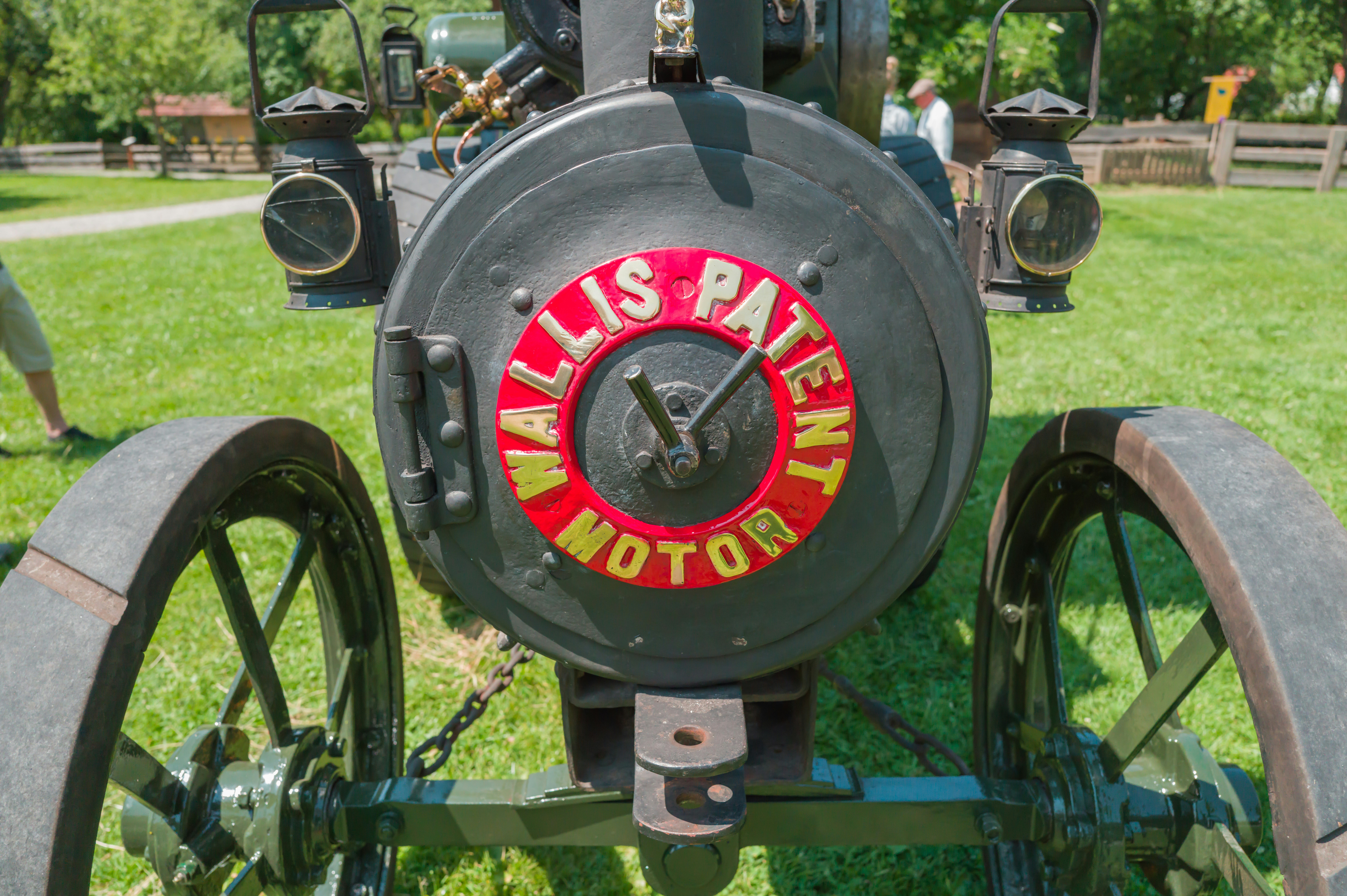 An antique wallis patent motor is on display.