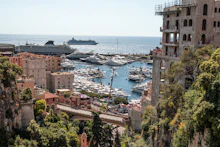 A Mediterranean harbor town with cruise ships