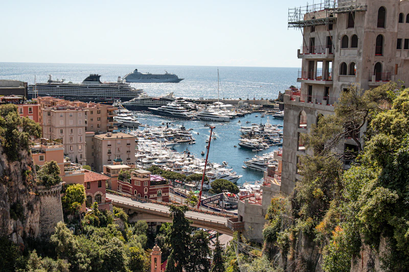 Scenic view of a harbor filled with yachts.