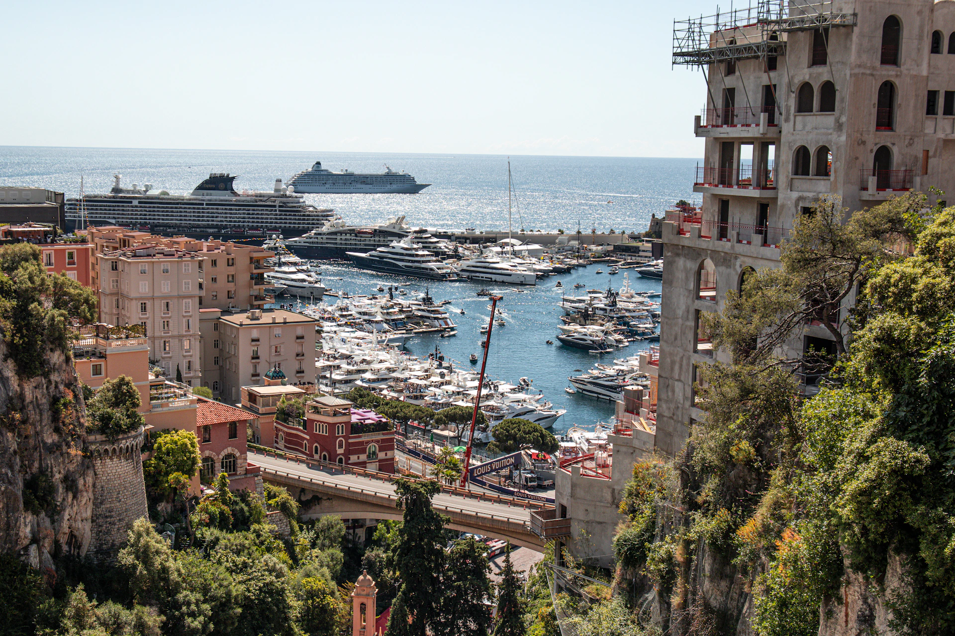 Scenic view of a harbor filled with yachts.