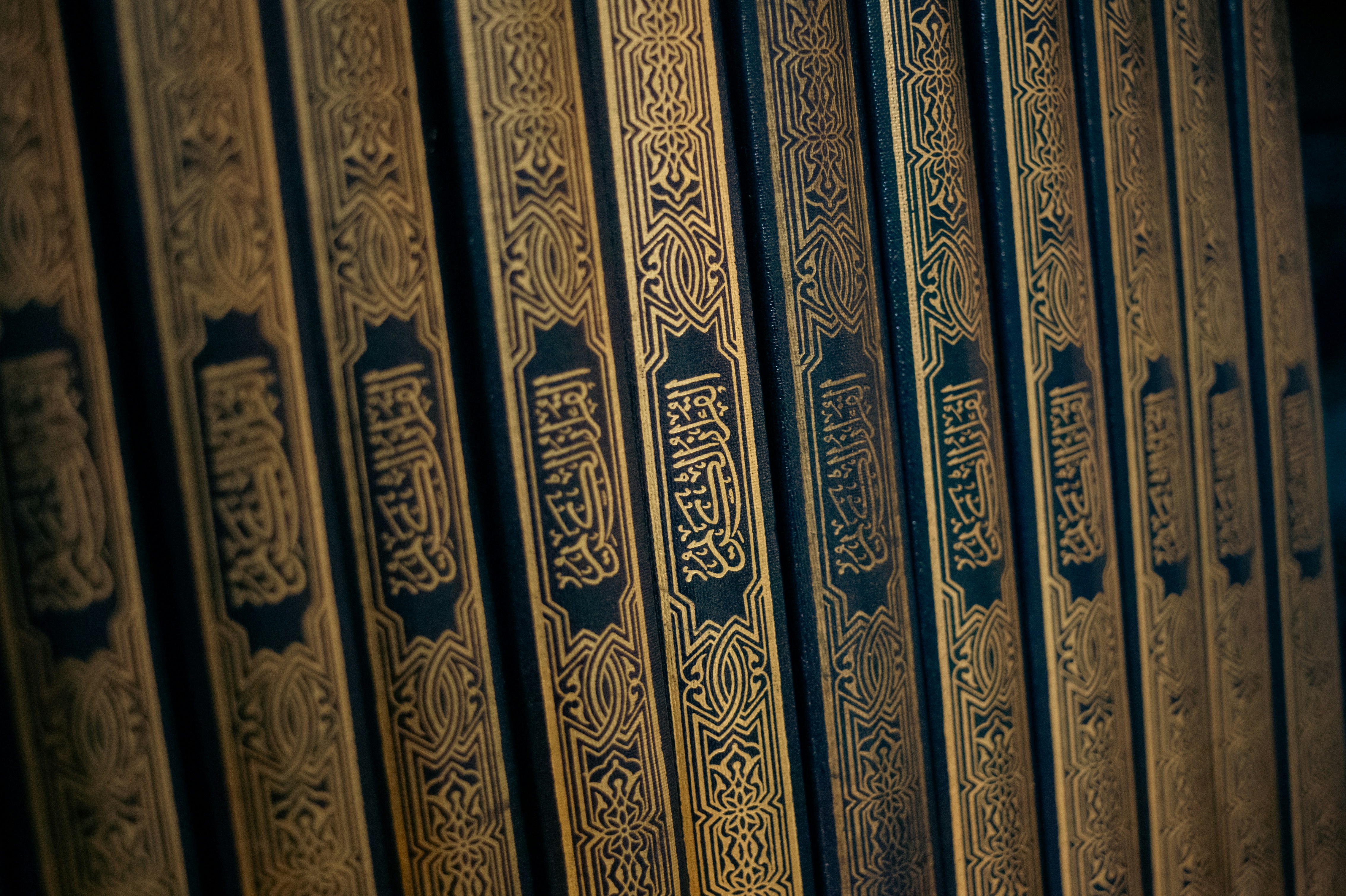 Books with beautiful, decorative, gold lettering.