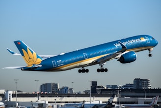 Getting around Vietnam A vietnam airlines plane is taking off.