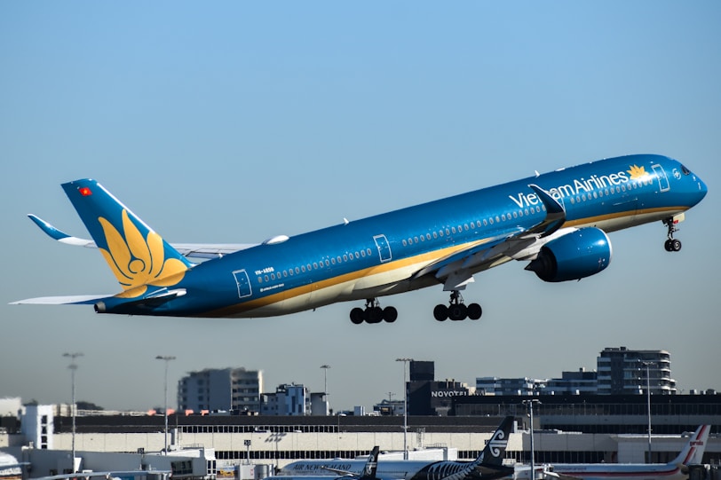 Getting around Vietnam A vietnam airlines plane is taking off.