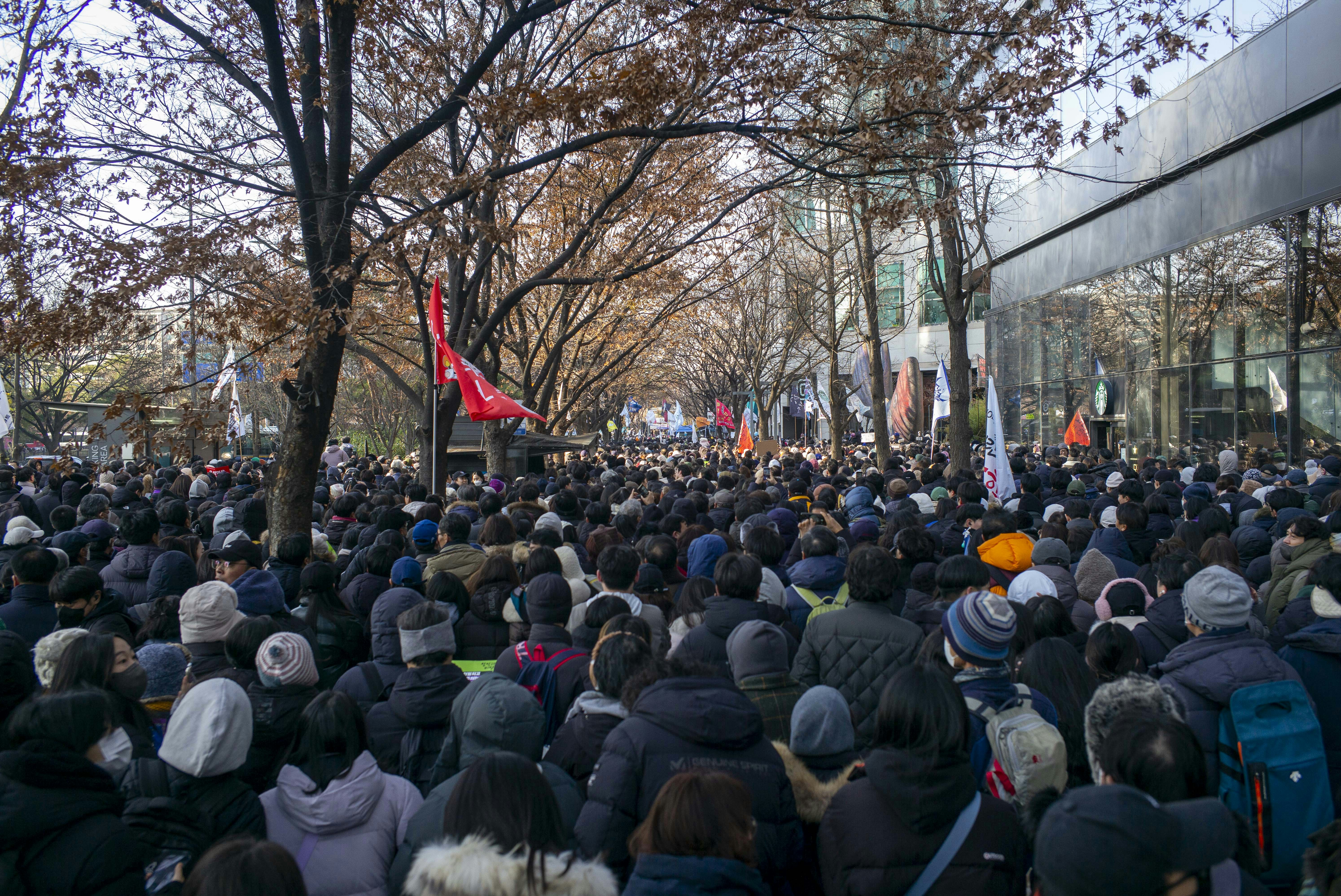 A large crowd of people gathered outside
