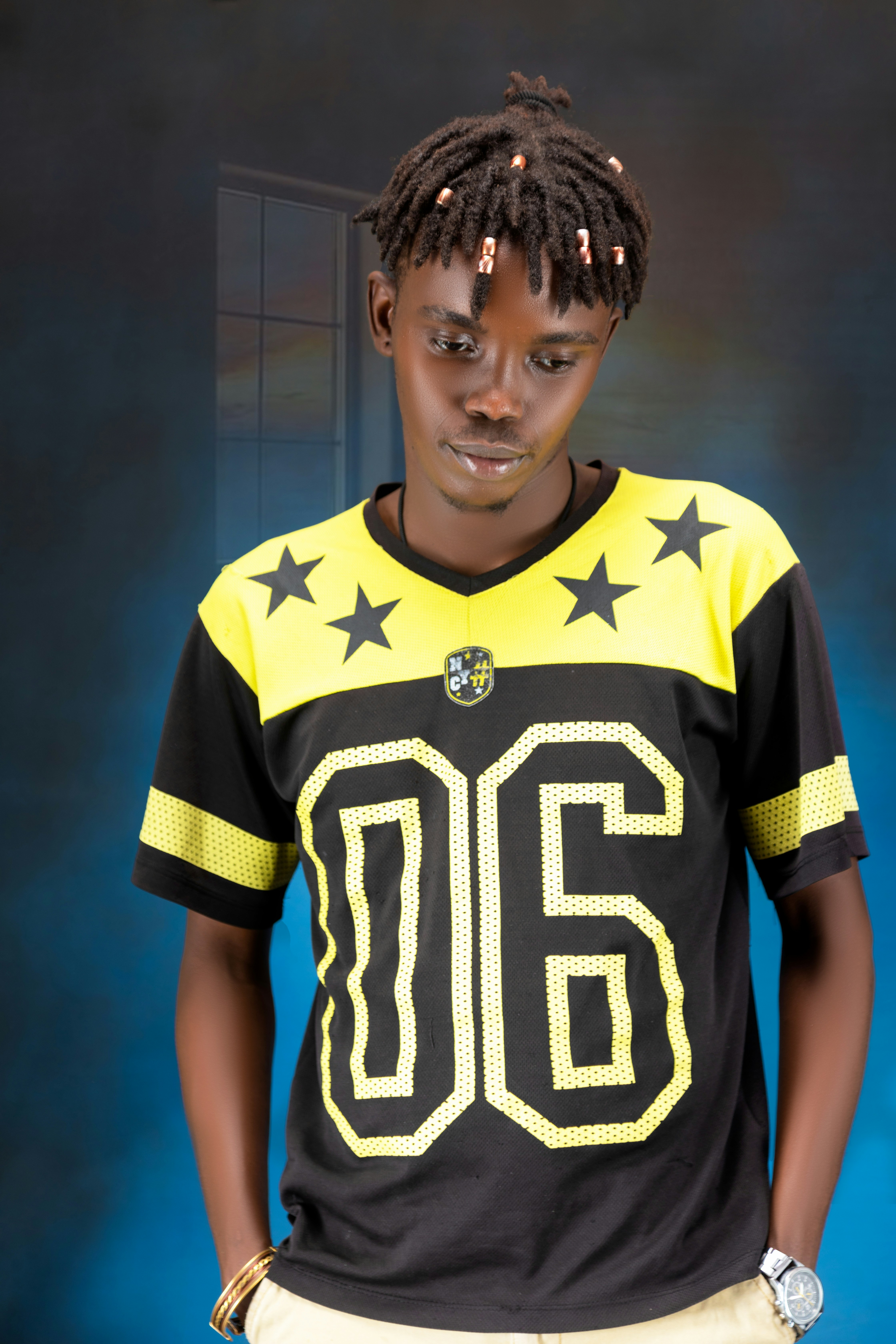 A young man poses for a portrait