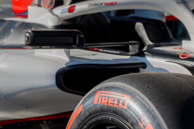 Close-up of a Formula 1 race car showing aerodynamic details and bodywork