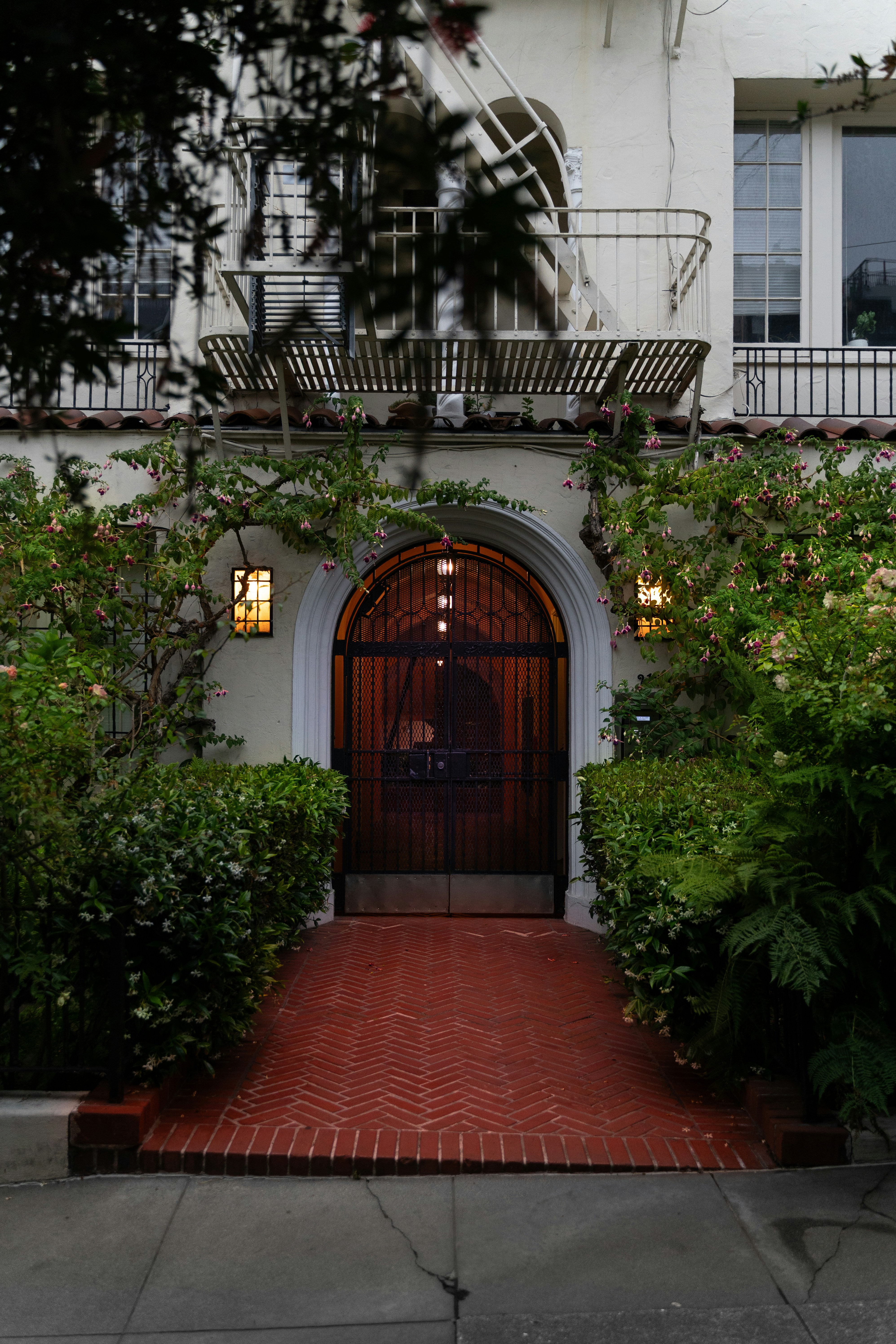 A beautiful arched doorway leads into a building.