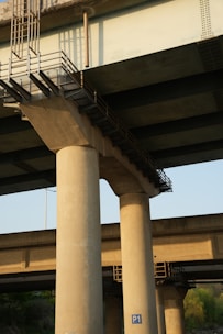 Concrete bridge supports are visible from below.