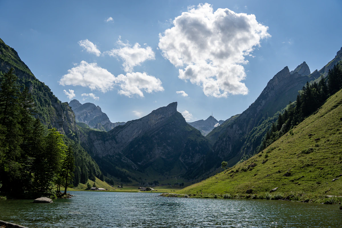 Seealpsee alpine lake in the Swiss Alps in summer, a cool summer luxury destination