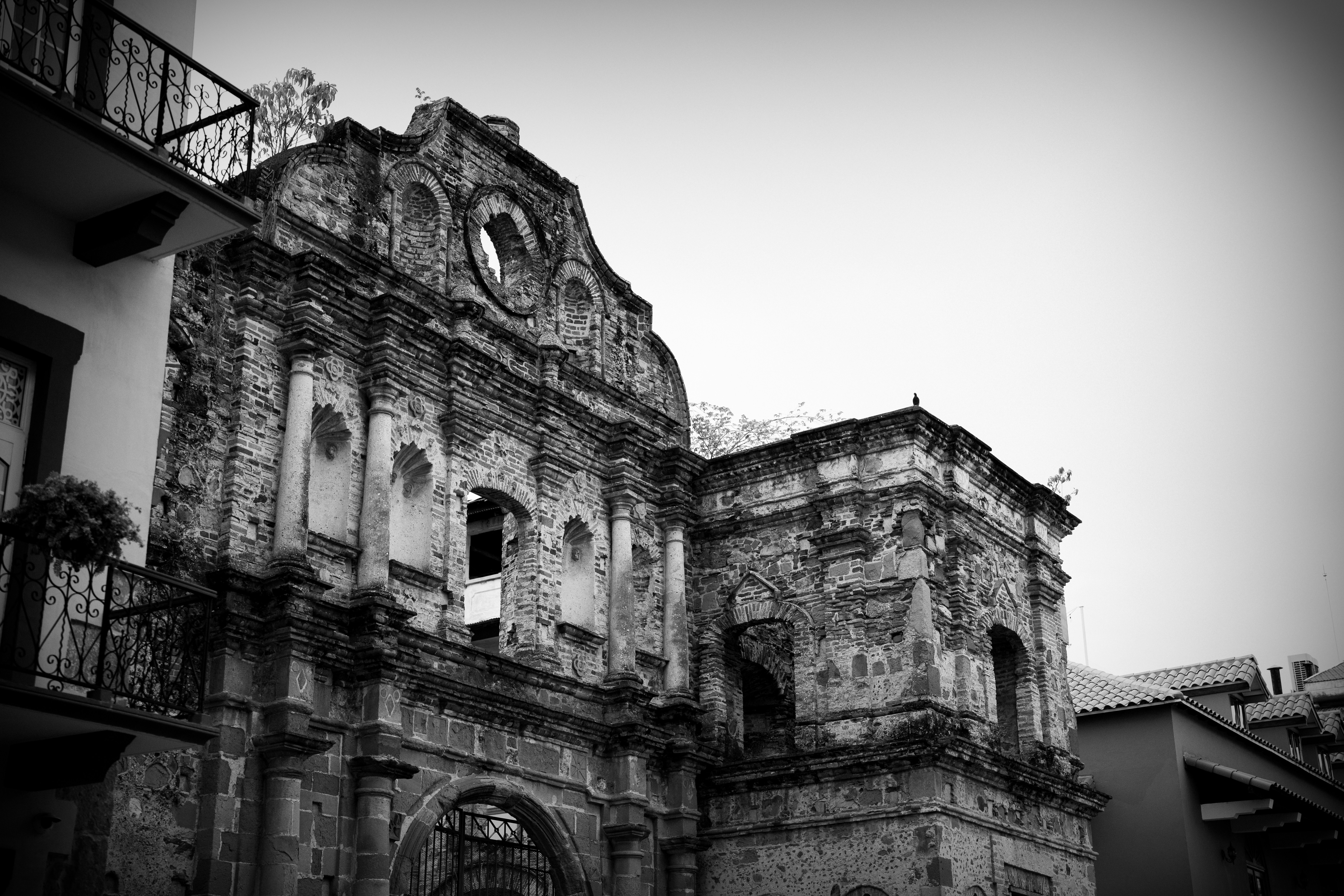 Ruined building with historic architectural details is shown.