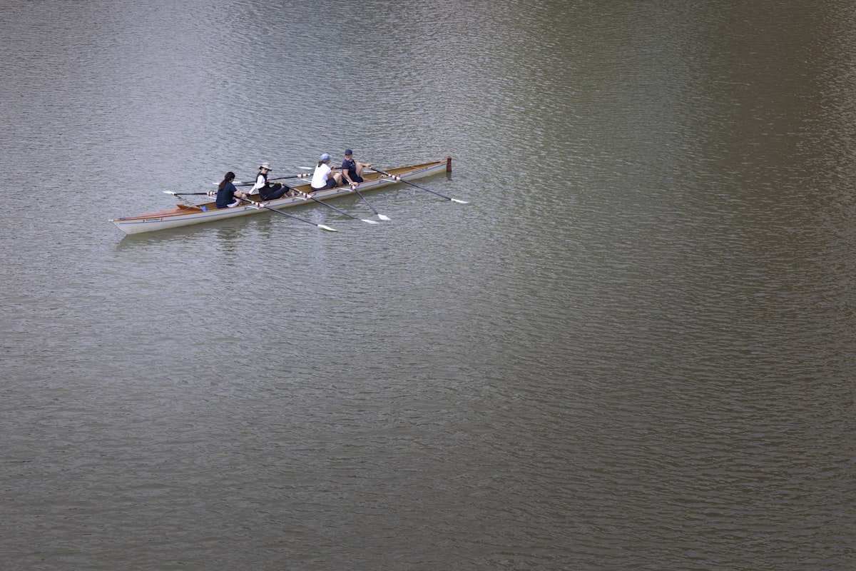 Four scullers in a white shell