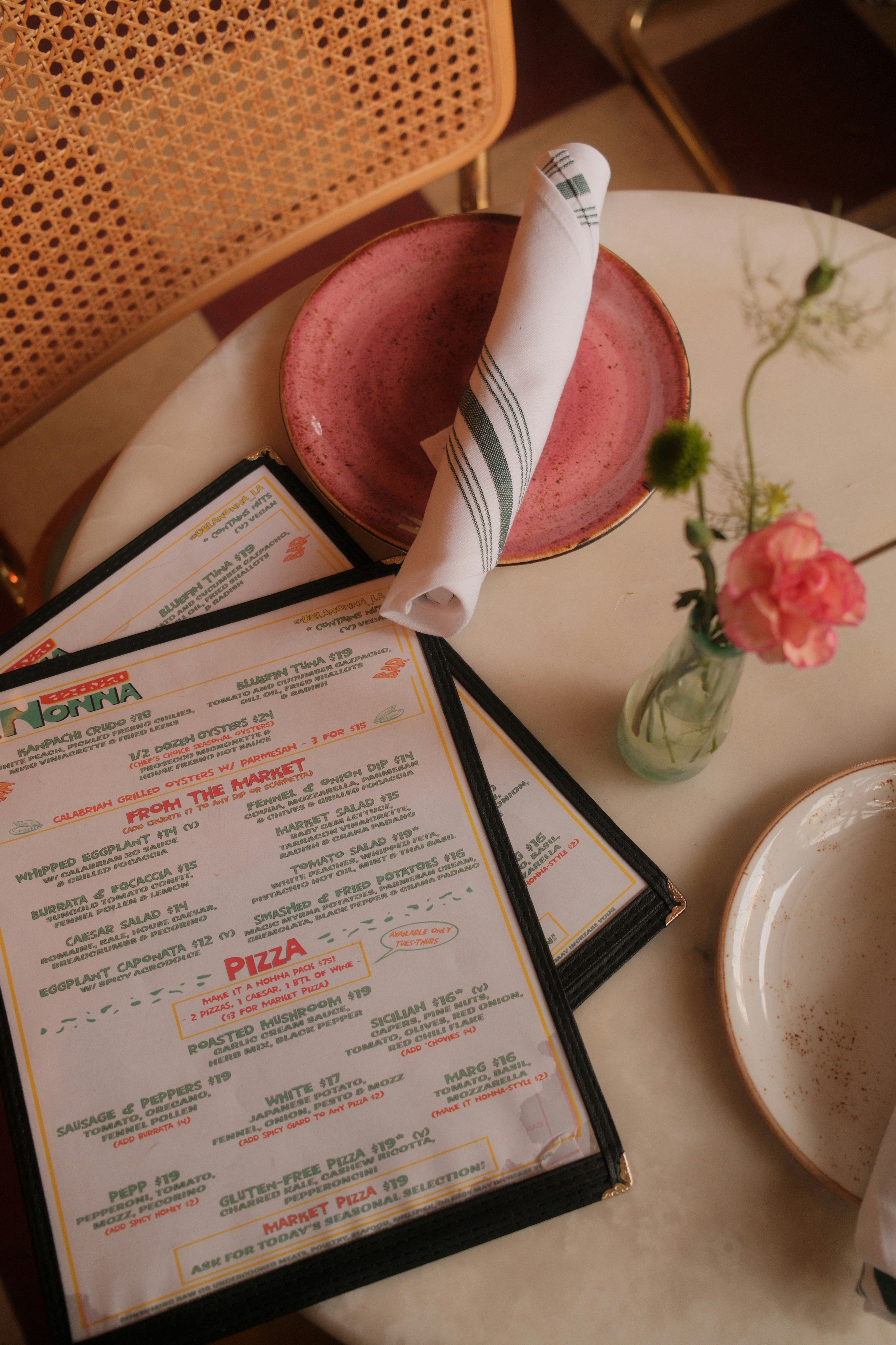 Restaurant table with a menu placed for diners
