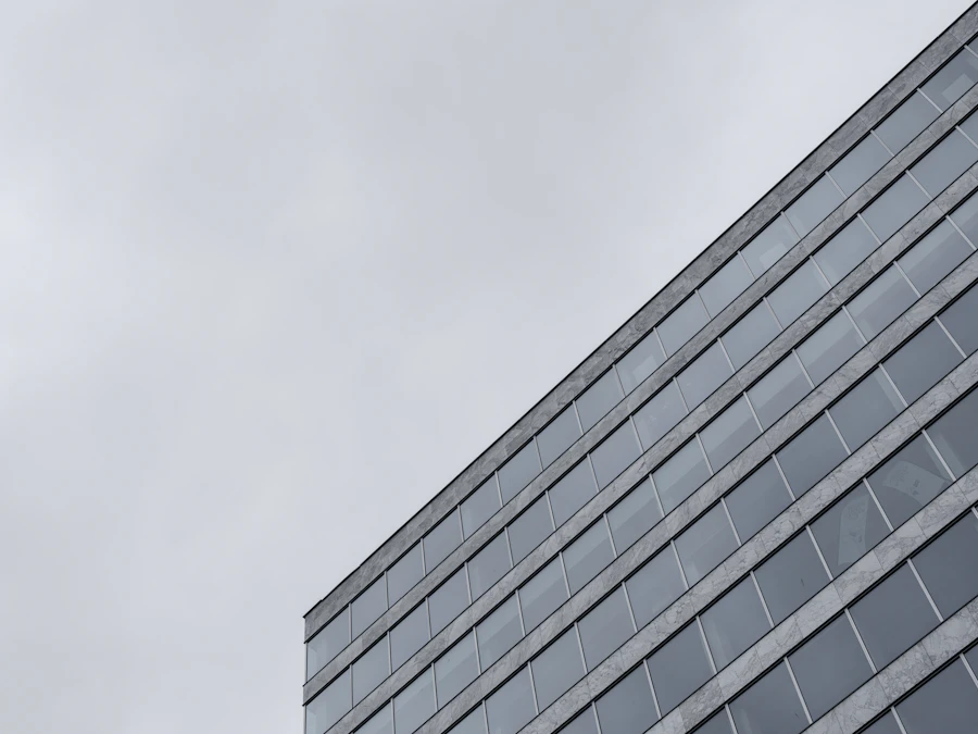 Modern office building against overcast sky