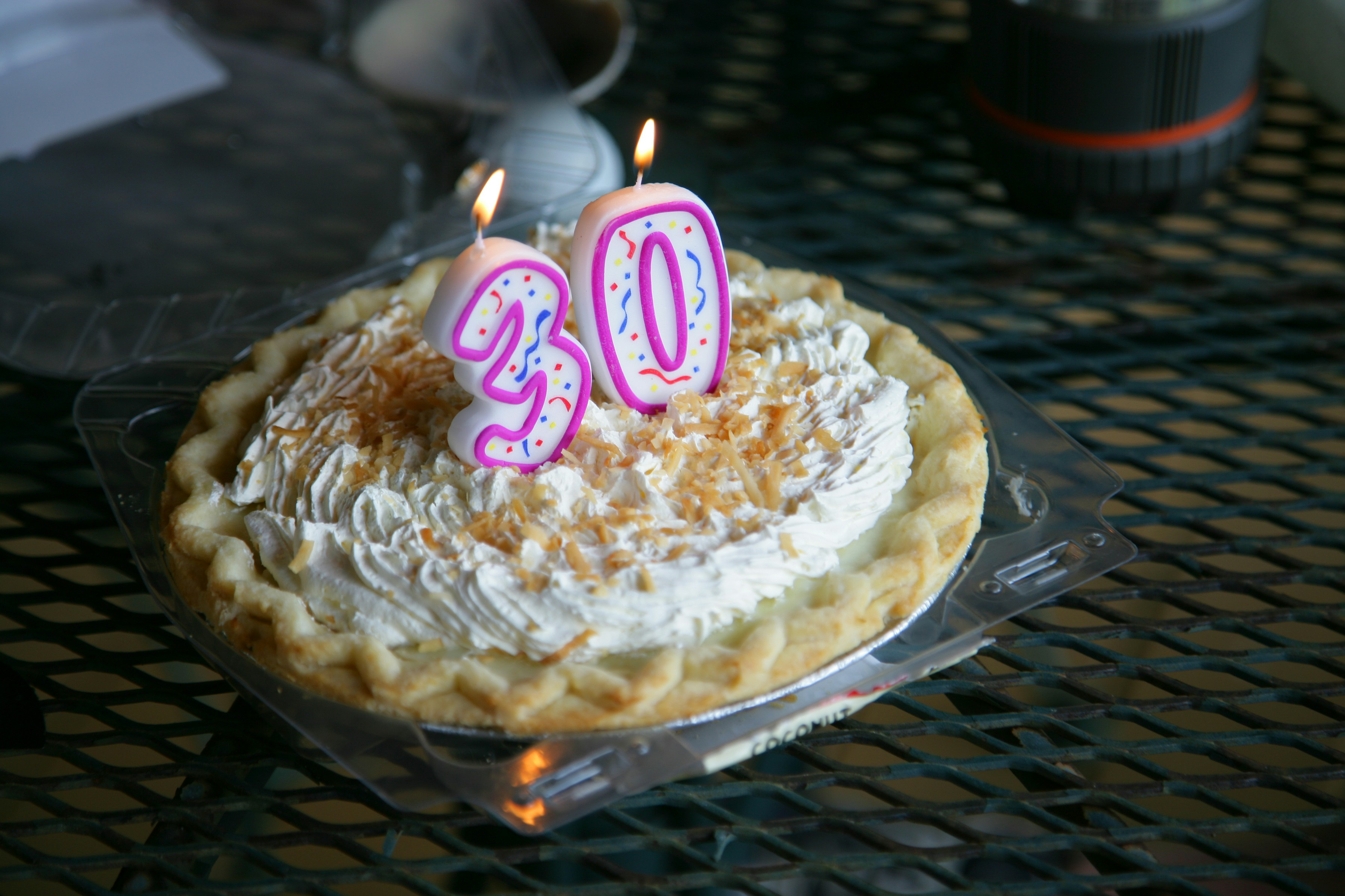 A birthday pie with "30" candles.
