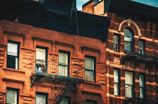 Historic new york city brownstone buildings stand tall.