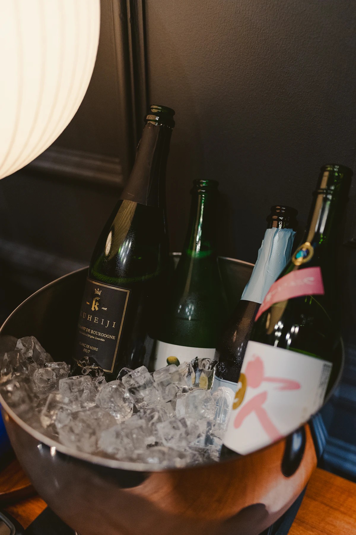 Real champagne bottles chilling in an ice bucket