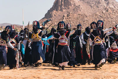 People perform a cultural dance outdoors
