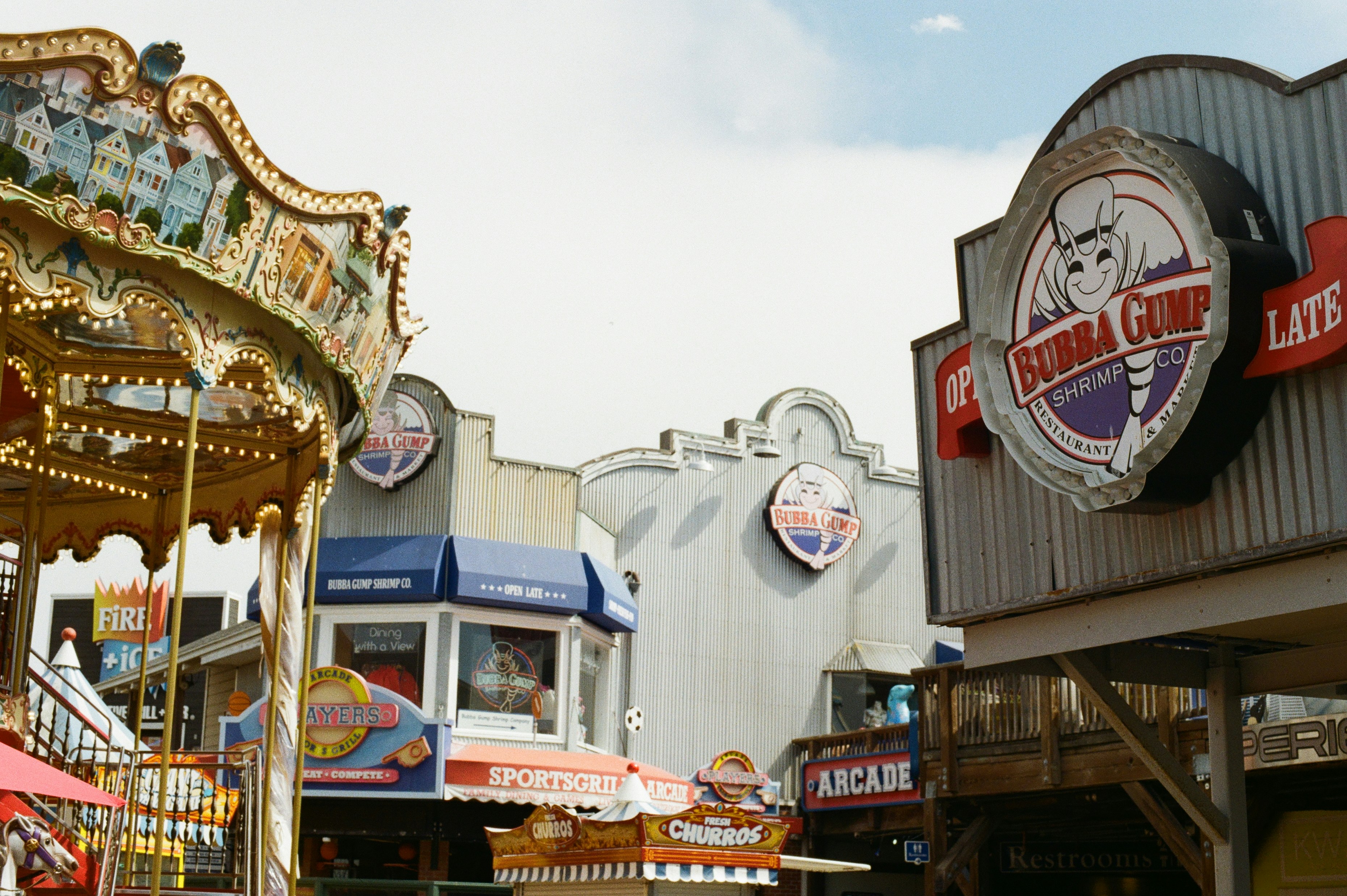 Buildings and a carousel are visible.