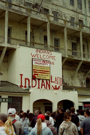 People gather at the entrance of alcatraz.