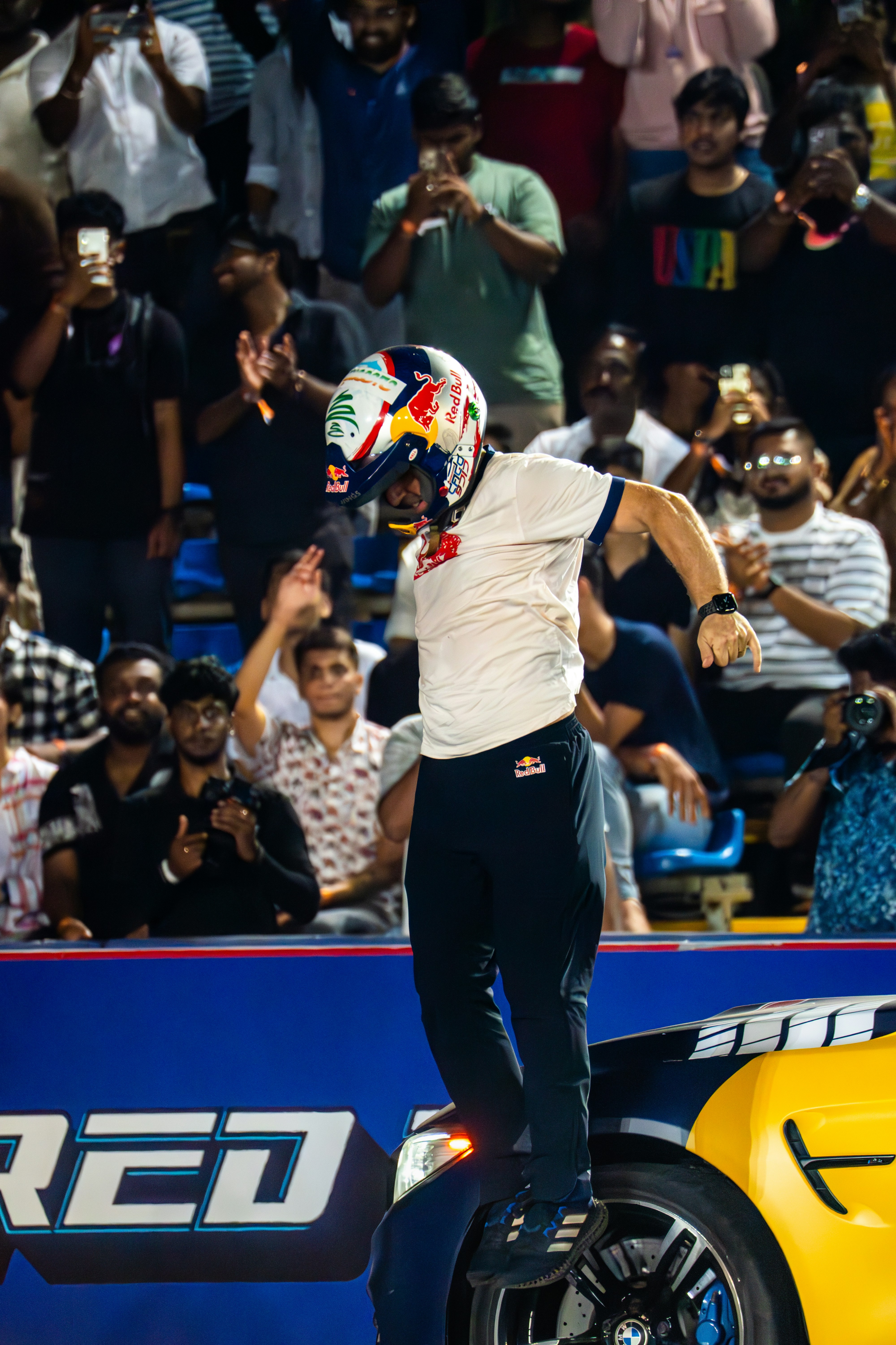 A race car driver celebrates victory with his fans. photo – Free Woman ...