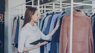 Woman shopping for clothes in a boutique.