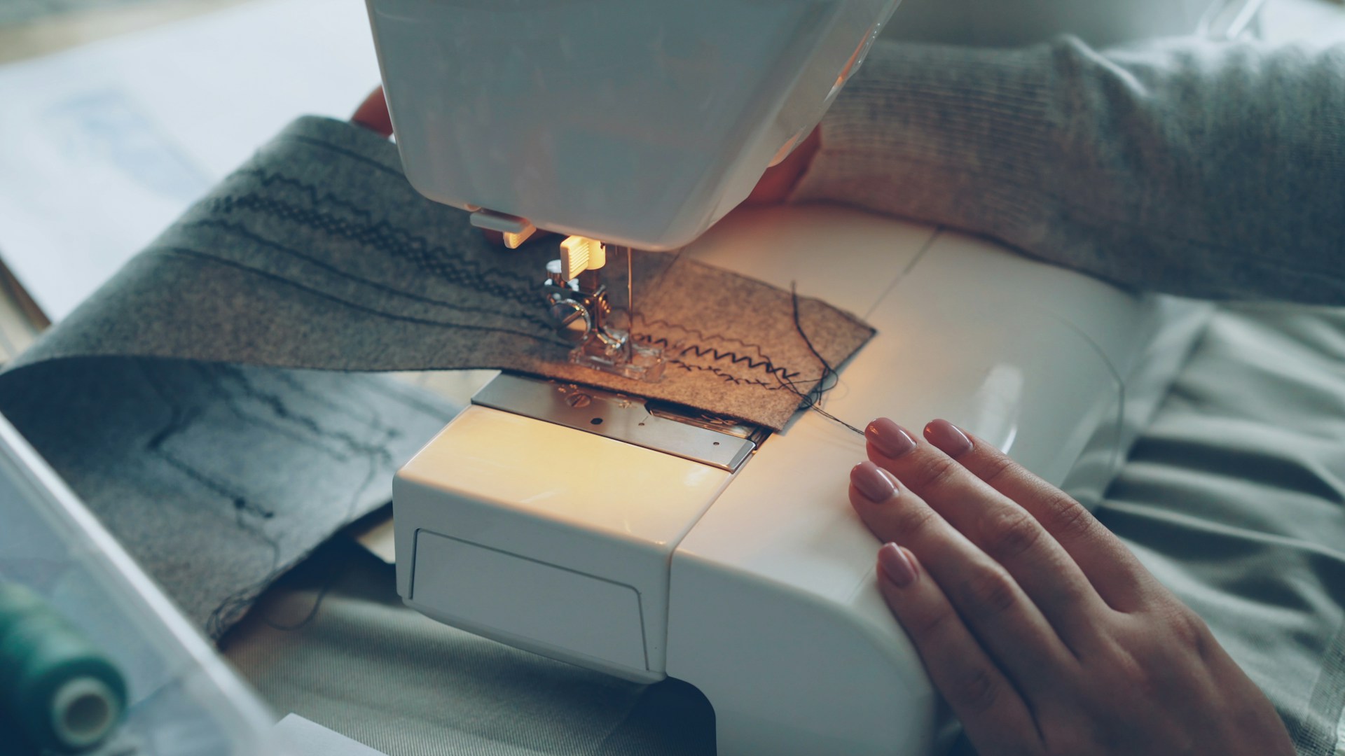 Someone is using a sewing machine.