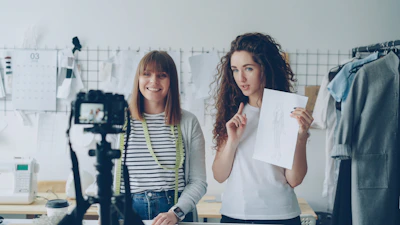 Two women are filming a video.