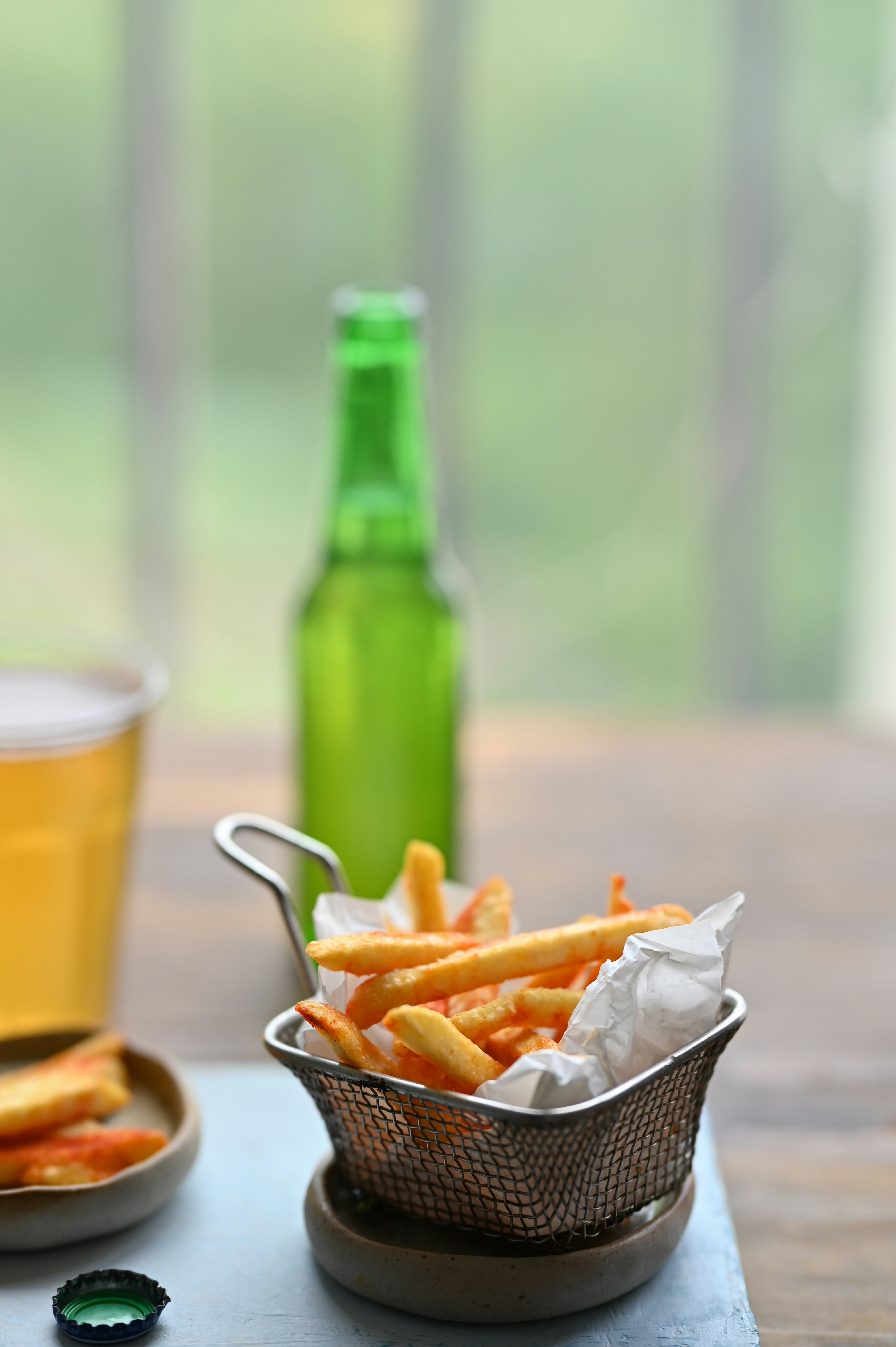 French fries, beer, and a relaxing scene.