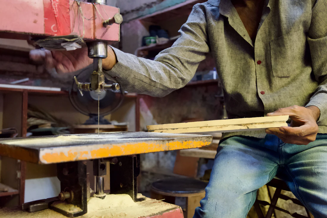 Carpenter at work in his shop