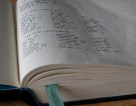 Open bible displays contents from the old and new testaments.