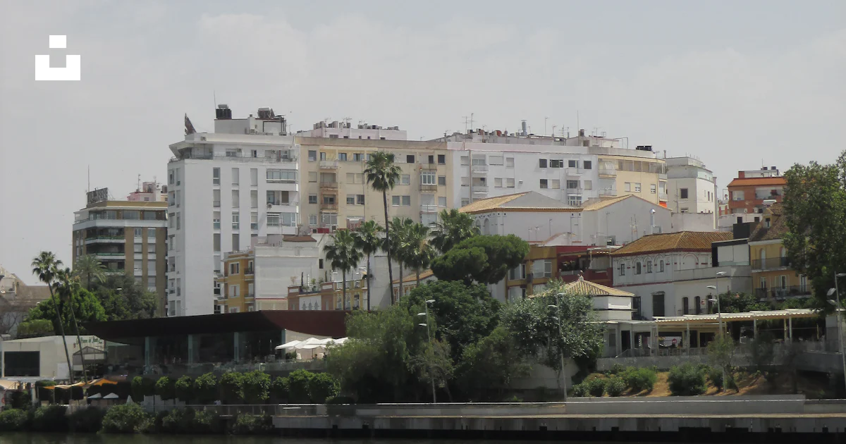 Splashed Buildings Buildings are viewed across the water. photo – Free Buildings Image on ...