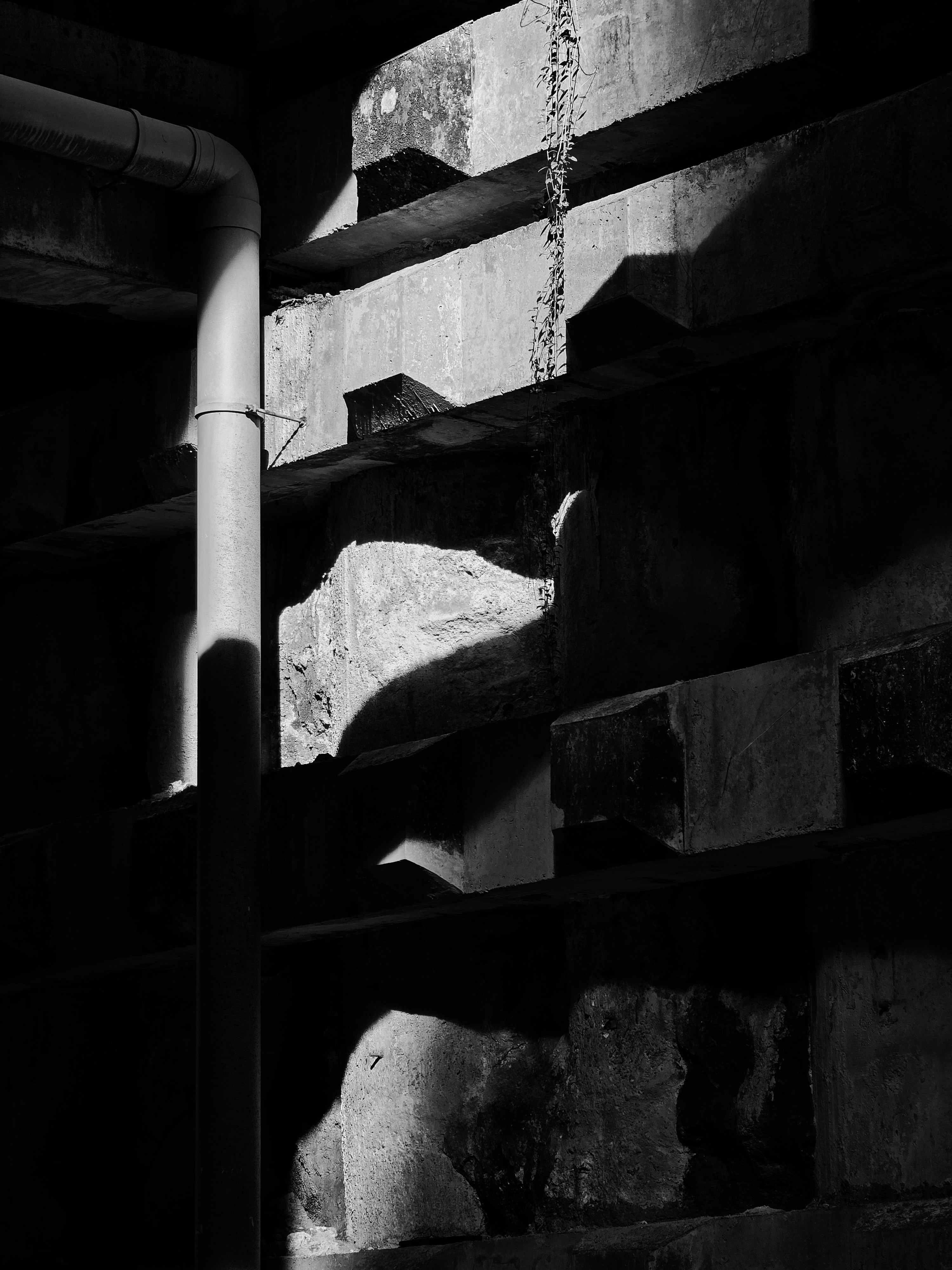 A bespoke floor-to-ceiling entertainment unit in a living room.