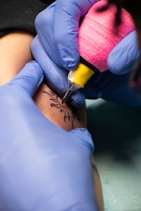 A person is getting tattooed.