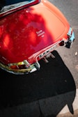 Red jaguar e-type car's back detail.
