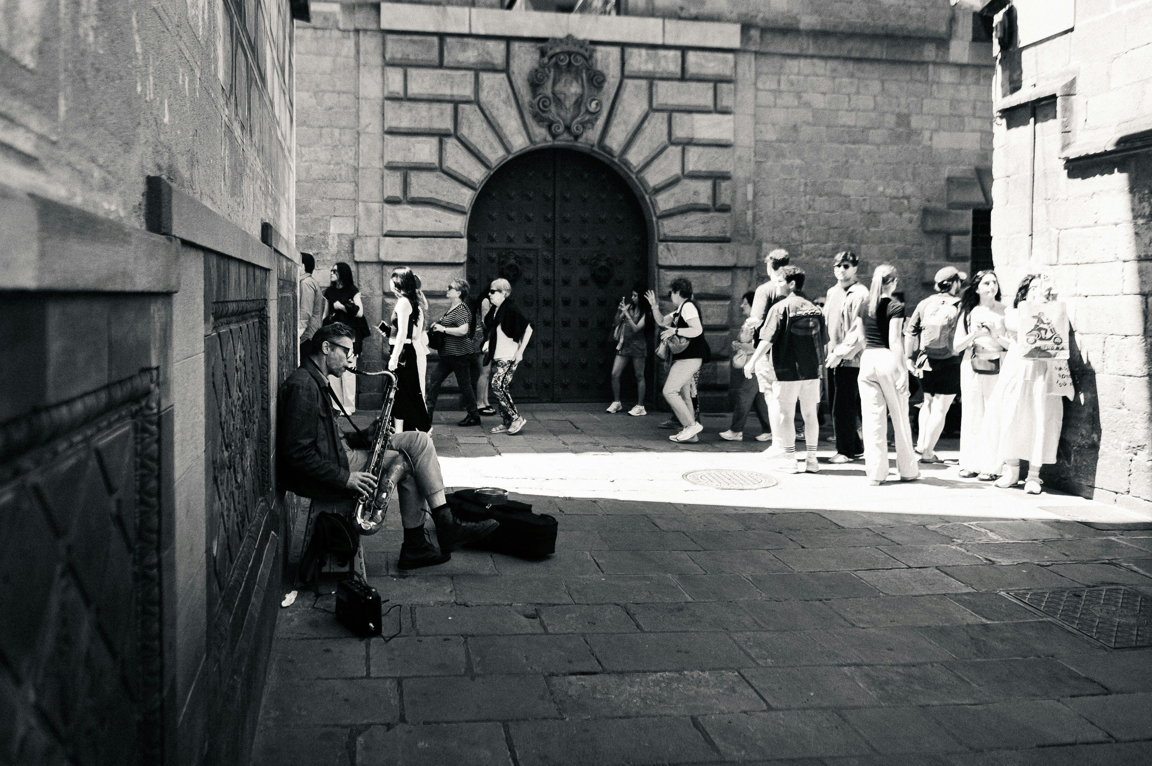 A musician plays for onlookers.