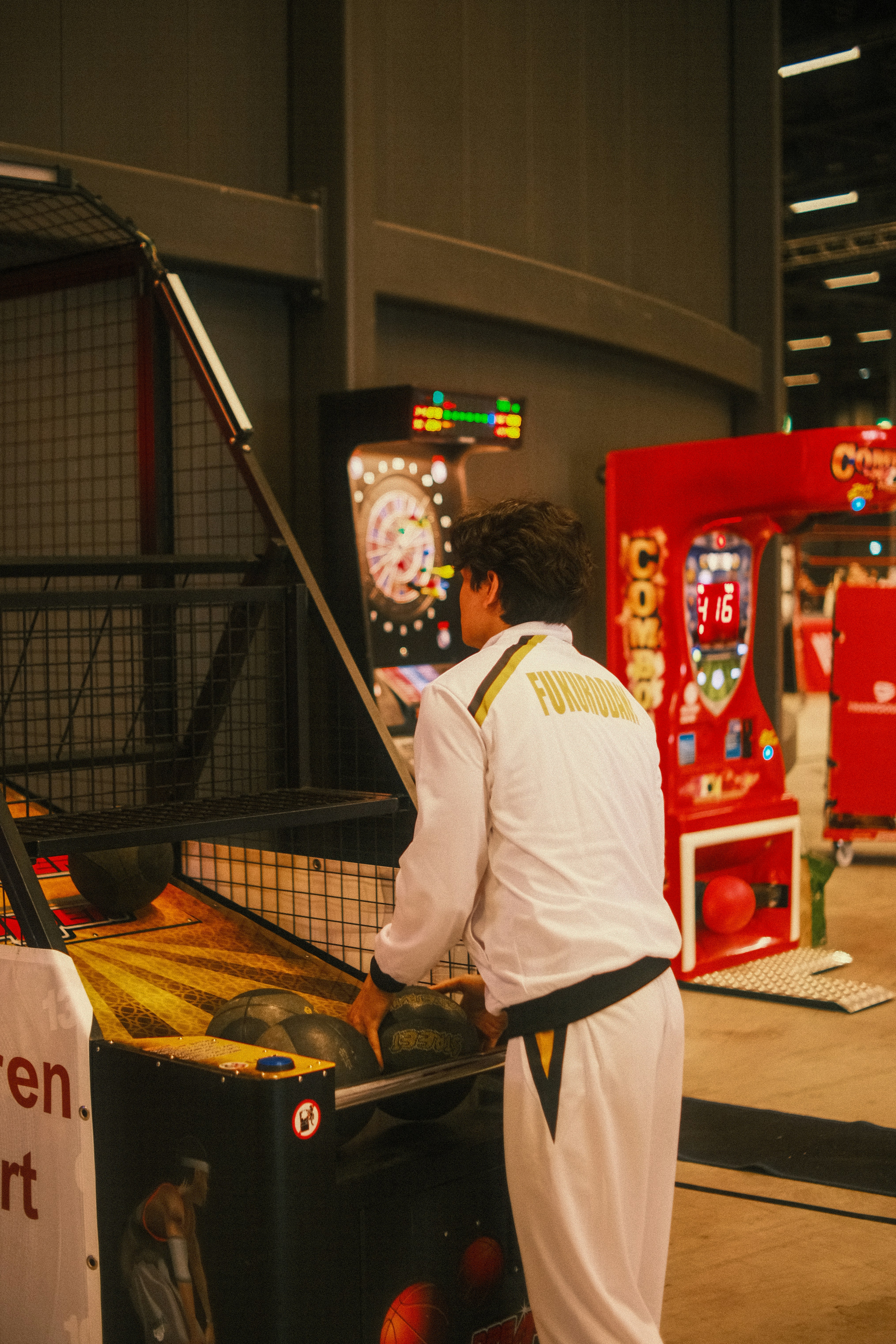 man playing basketball.