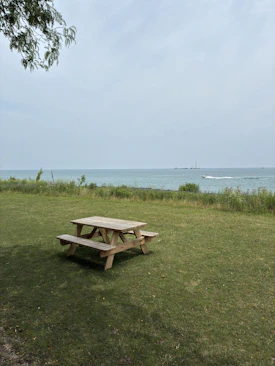 Picnic table overlooks a serene lake on chicago's north shore
